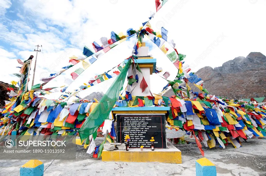 Buddhist prayer flags flapping in the wind at the Sela Mountain Pass at 13700 feet, Tawang district, Arunachal Pradesh, India, Asia
