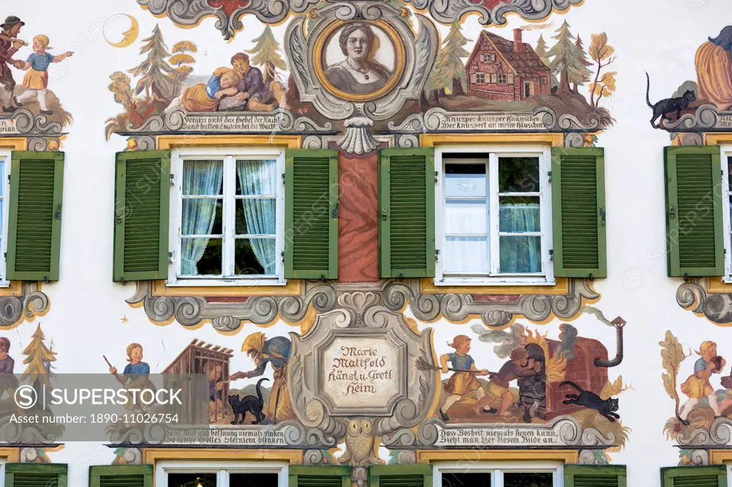 Painted facade of Grimms Fairy Tale story of Hansel and Gretel in the village of Oberammergau in Bavaria, Germany, Europe