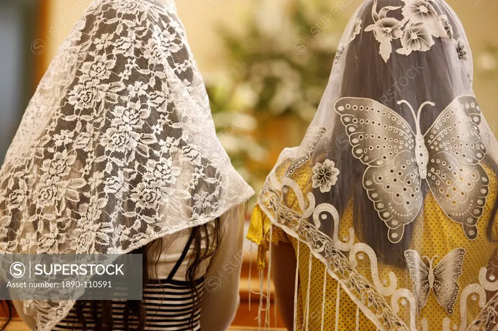 Women wearing embroidered veils at Holy Mass, Beit Jala, West Bank, Palestine National Authority, Middle East