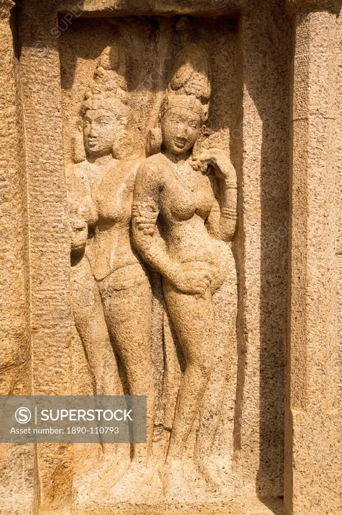 The stone figures of two women within the Five Rathas Panch Rathas complex at Mahabalipuram Mamallapuram, UNESCO World Heritage Site, Tamil Nadu, Indi...