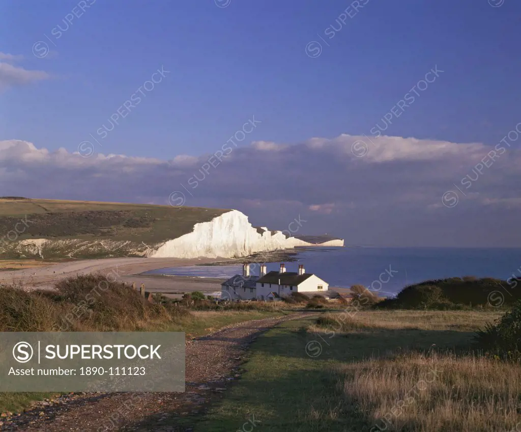 White chalk cliffs of the Seven Sisters at Cuckmere Haven, seen from near Seaford, East Sussex, England, United Kingdom, Europe