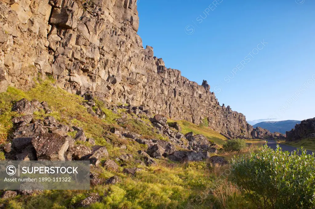 The Almannagja All Man´s Gorge cliff face is the backdrop of the Althing, legislative assembly of the past, also the edge of the north American tecton...