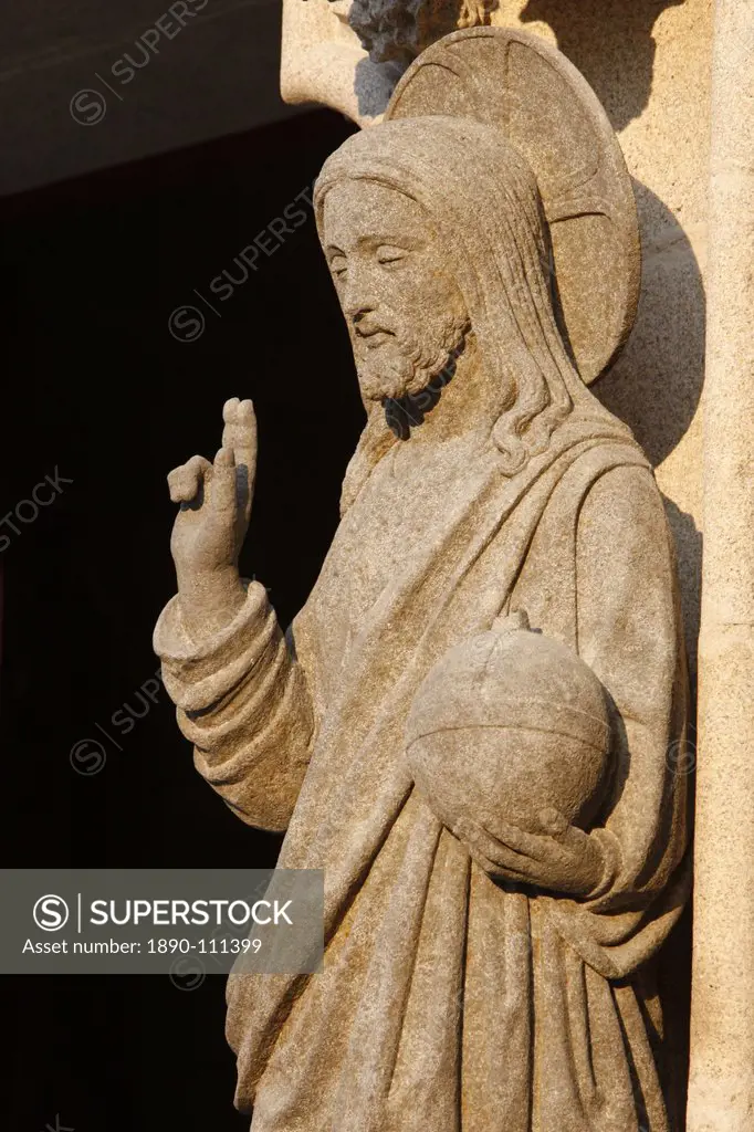 Western gate sculpture of the risen Christ holding the world, Saint_Corentin Cathedral, Quimper, Finistere, Brittany, France, Europe