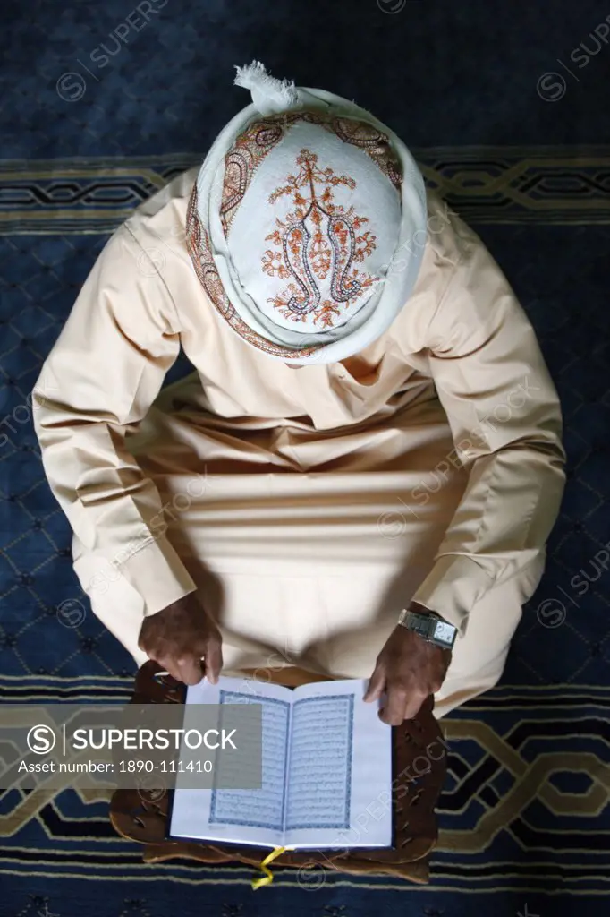 Koran reading in a mosque, Dubai, United Arab Emirates, Middle East