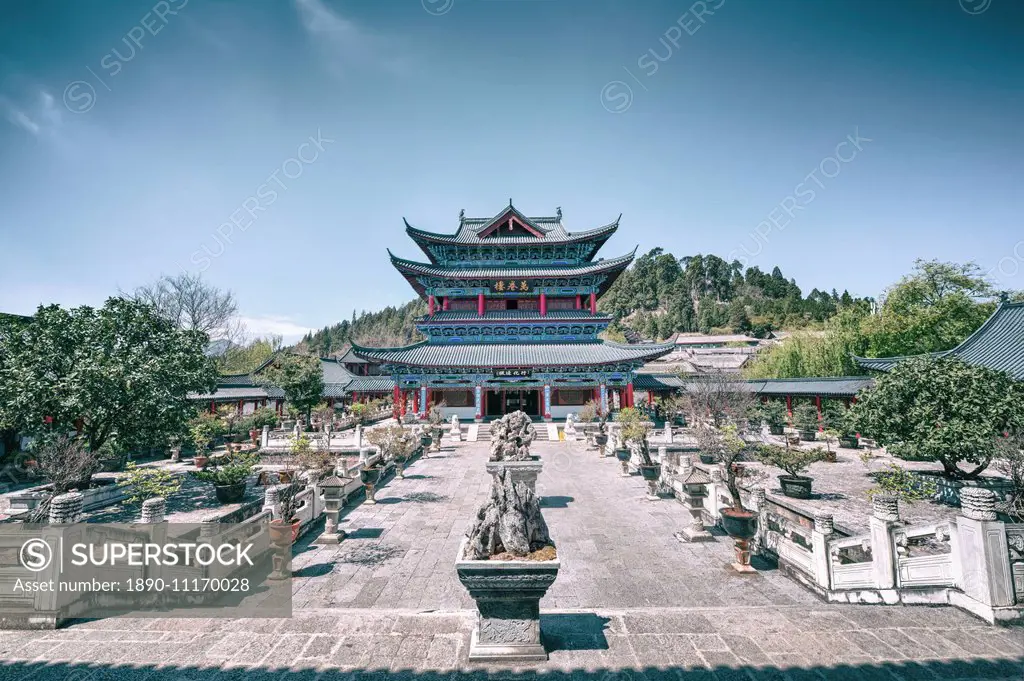 Wanjuan Pavilion, one of the main buildings at Mufu Wood Mansion with potted bonsai and rocks, Lijiang, Yunnan, China, Asia