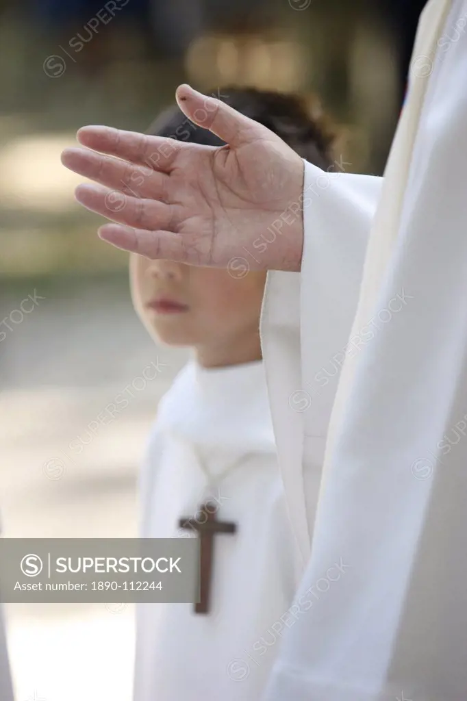 Priest and altar boy, La Roche_sur_Foron, Haute Savoie, France, Europe