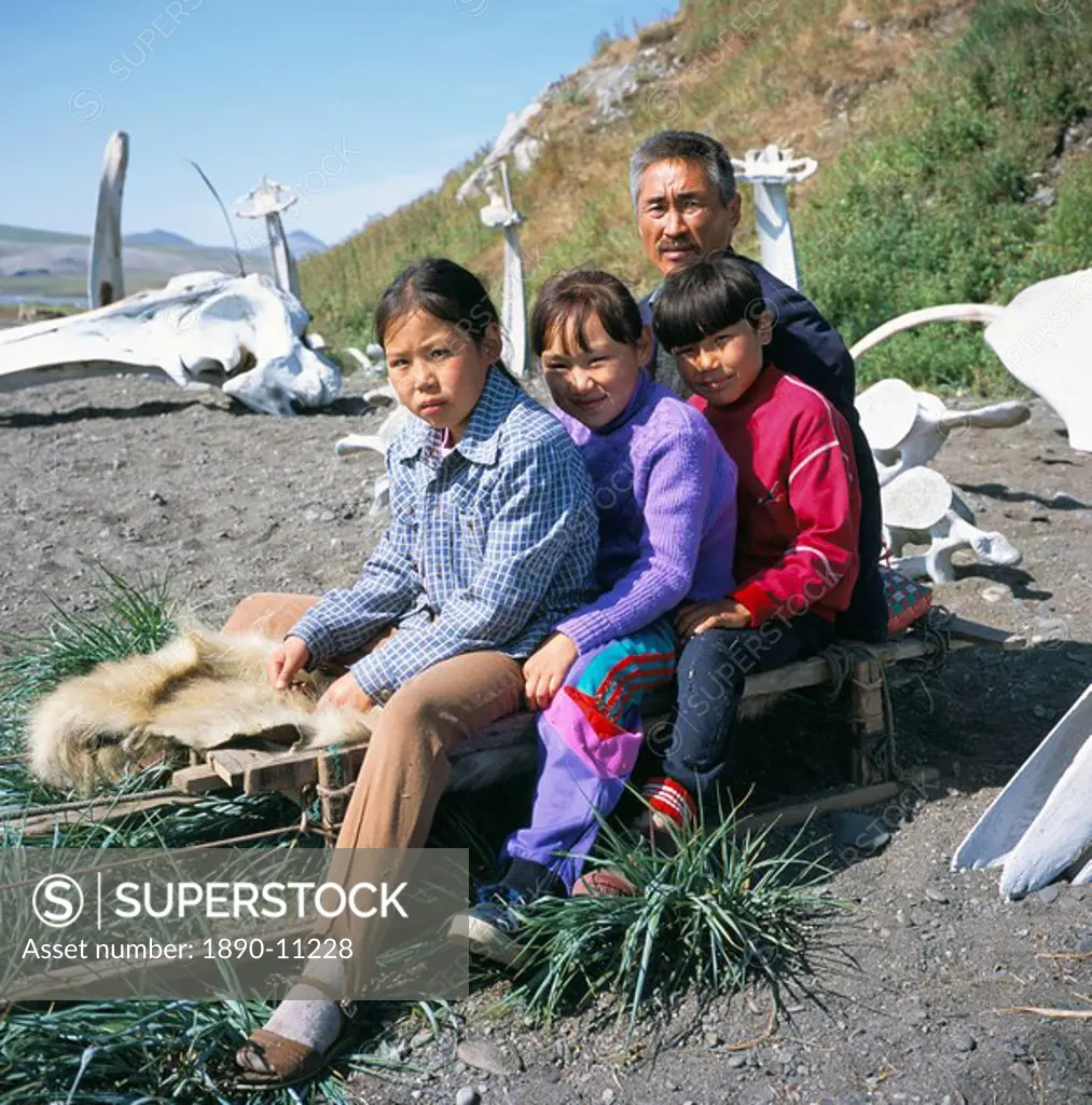 Eskimos, sledge and whale bones at Yanrakino village population 150, Chukchi Peninsula, Russian Far East, Russia, Asia