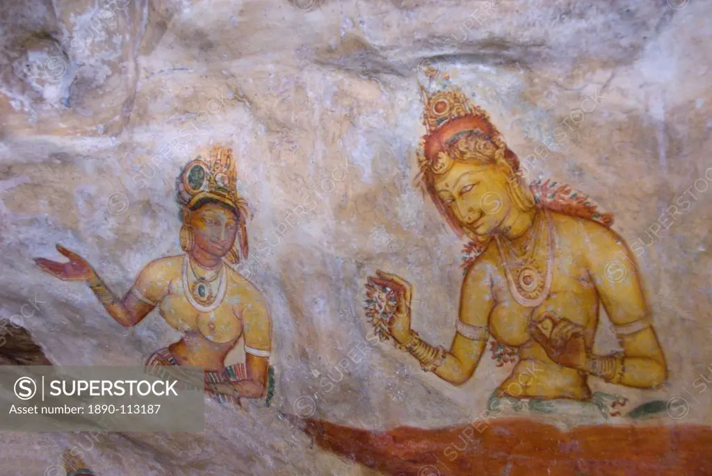 Buddhist frescoes in cave gallery part way up Lion Rock, Sigiriya, UNESCO World Heritage Site, Sri Lanka, Asia