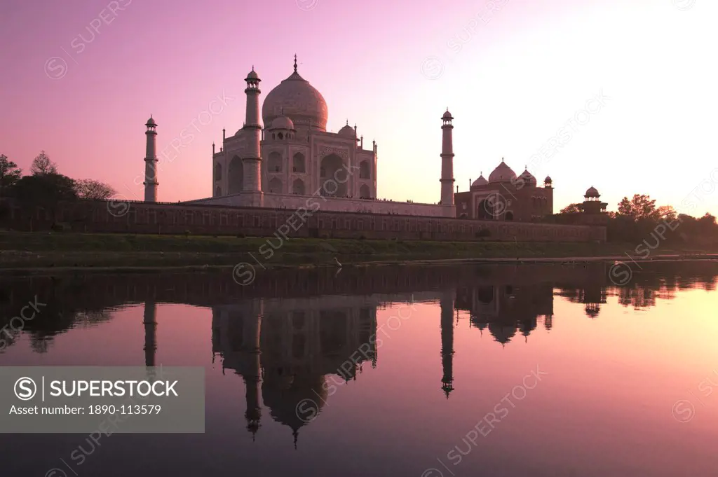 The Taj Mahal, UNESCO World Heritage Site, at sunset reflected in the Yamuna River, Agra, Uttar Pradesh, India, Asia