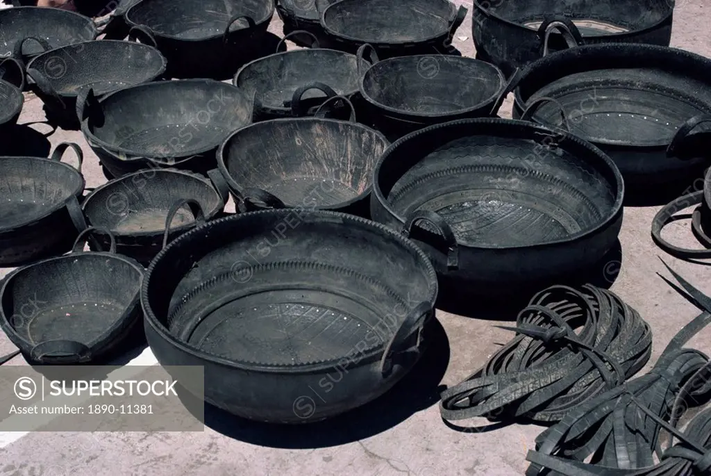 A selection of buckets made from recycled tyres for sale at Pujilo market in Ecuador, South America