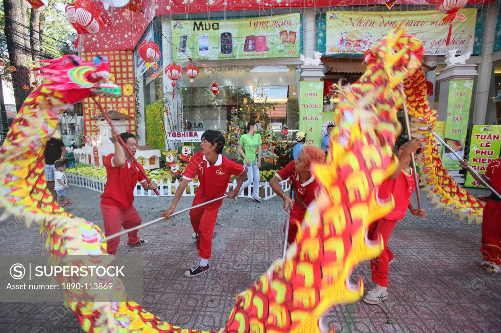 Dragon dance performers, Chinese New Year, Ho Chi Minh City, Vietnam, Indochina, Southeast Asia, Asia