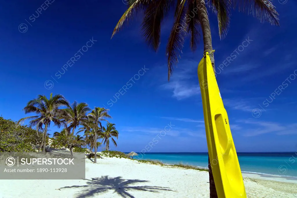Yellow canoe at the white sand beach of Playa del Este, Cuba, West Indies, Caribbean, Central America