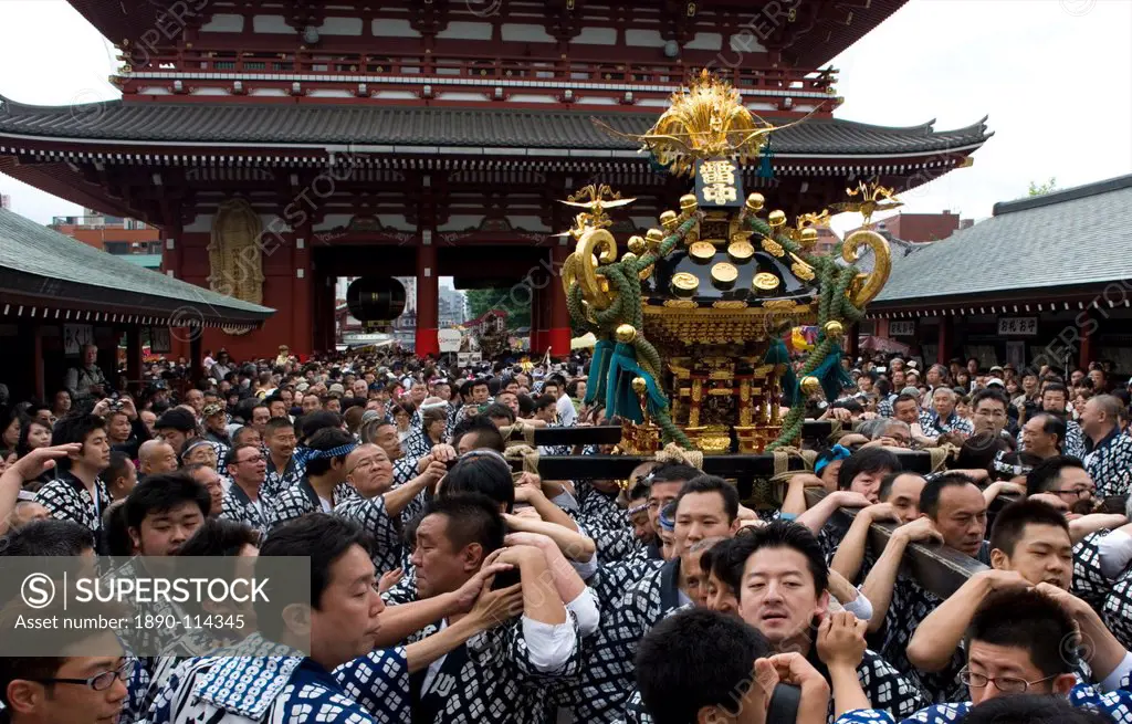 A mikoshi portable shrine being carried to Sensoji Temple during the Sanja Festival in Asakusa, Tokyo, Japan, Asia