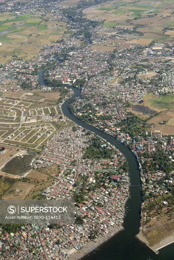 Aerial view of dormitory township on river into south end of Manila Bay, Manila, Philippines, Southeast Asia, Asia