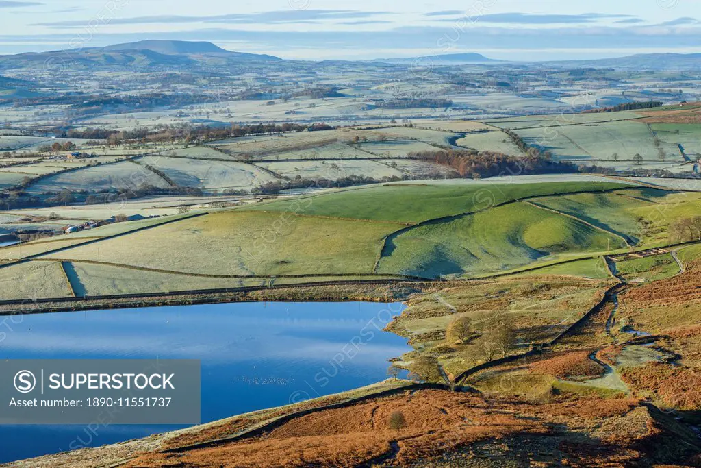 Early morning view in late autumn from Embsay Crag, overlooking the reservoir and Pendle Hill beyond, North Yorkshire, Yorkshire, England, United King...