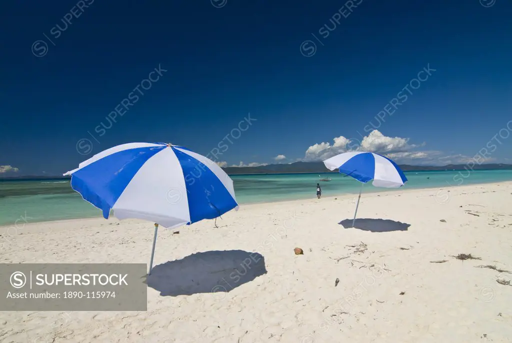 Parasols at the beautiful beach in Nosy Iranja, a little island near Nosy Be, Madagascar, Indian Ocean, Africa