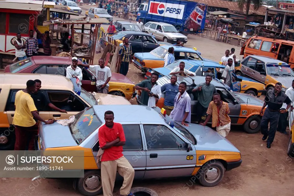 Taxis and drivers on street, Kasoa, Ghana, West Africa, Africa