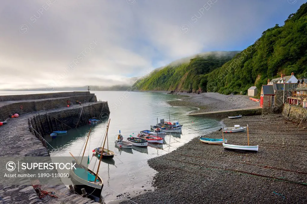 Fishing boats moored in the harbour at Clovelly, Devon, England, United Kingdom, Europe