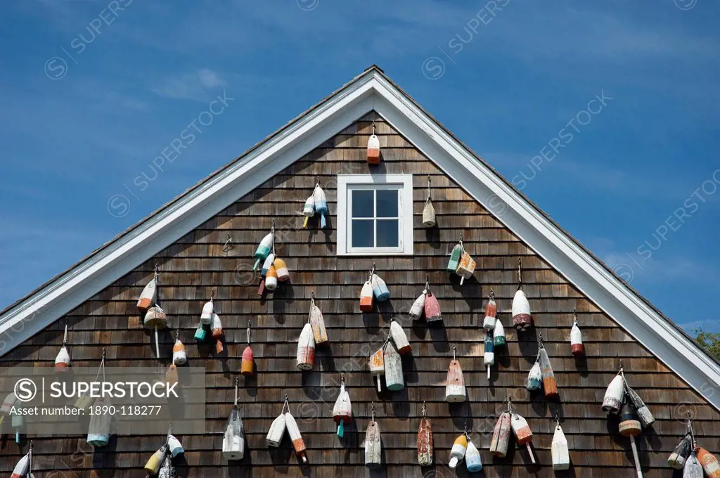 Painted wooden buoys on a shingled building in Sag Harbor, Long Island, New York State, United States of America, North America