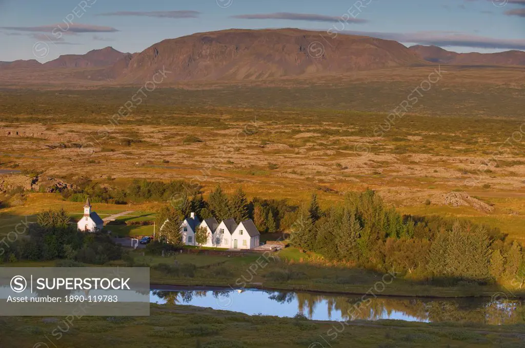 Thingvellir national church and Thingvallabaer, a five_gabled farmhouse, official summer residence of Iceland´s Prime Minister, on the banks of River ...