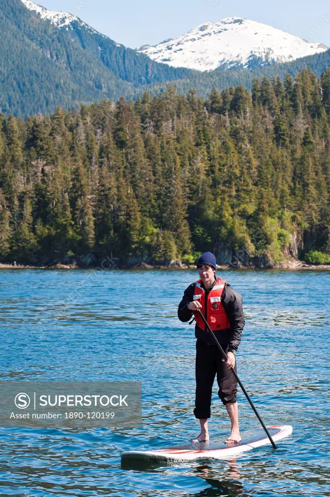 Paddleboarding in Windham Bay in the Chuck River Wilderness Area, Southeast Alaska, United States of America, North America