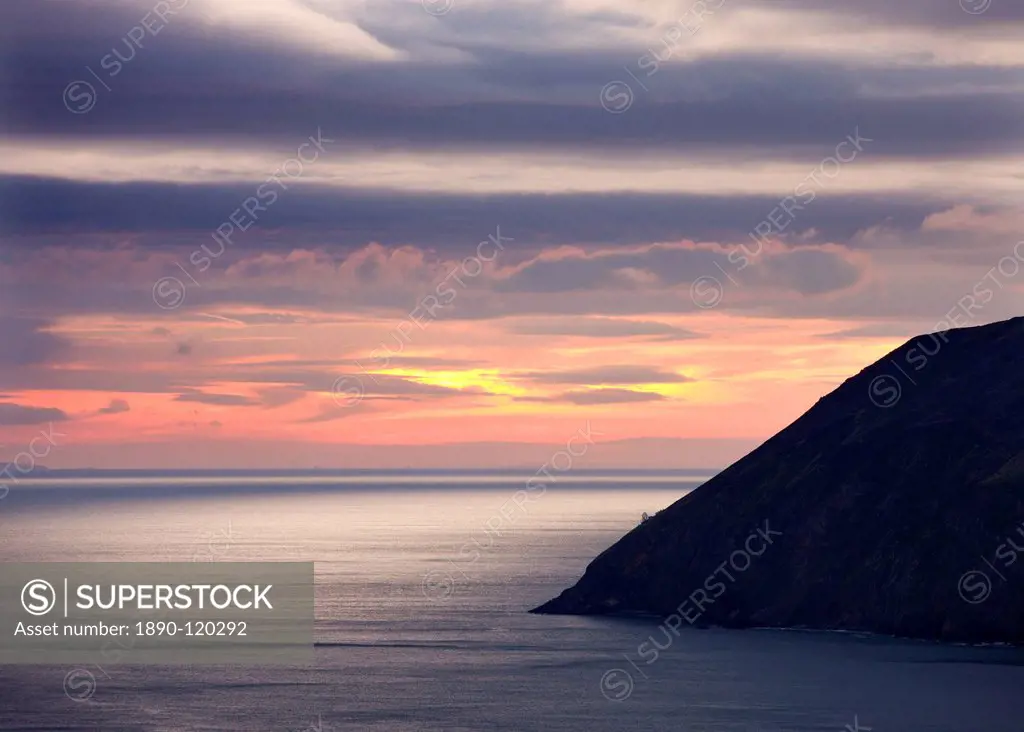 Foreland Lighthouse is barely visible near the base of the mighty cliffs of Foreland Point, Countisbury, Exmoor National Park, Devon, England, United ...