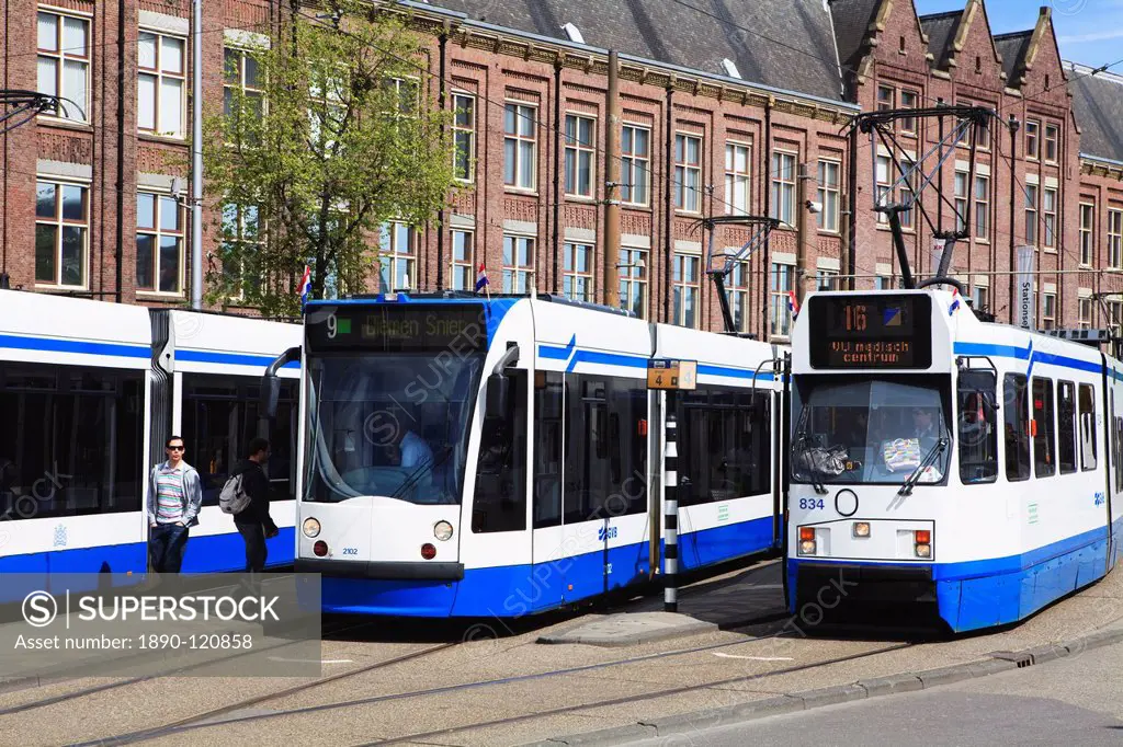 Centraal Station and trams, Amsterdam, Netherlands, Europe