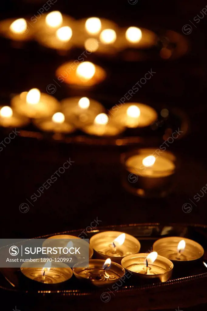 Candle offering for Wesak celebrating Buddha´s birthday, awakening and Nirvana, Great Buddhist Temple Grande Pagode de Vincennes, Paris, France, Europ...