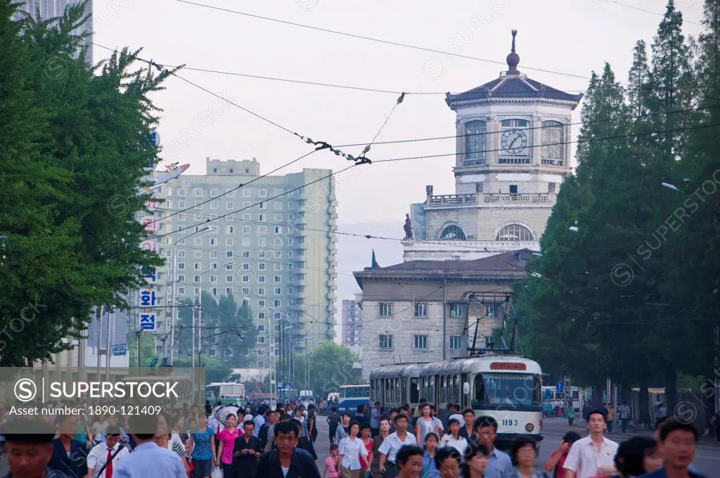 Busy street in front of the Pyongyang railway station, Pyongyang, North Korea, Asia