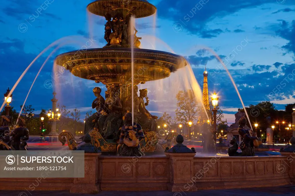 Water fountain and Eiffel Tower at night, Place de la Concorde, Paris, France, Europe