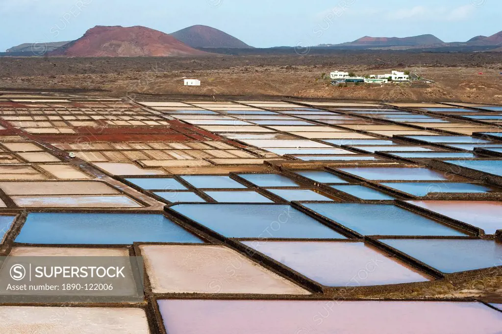 The only salt pans on the island still being worked, at Salinas de Janubio in the south, Salinas de Janubio, Teguise, Lanzarote, Canary Islands, Spain...