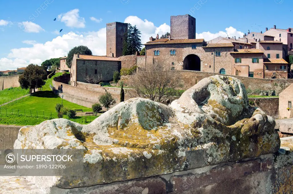 View of Tuscania from Piazza Bastianini and Etruscan sarcophagus, Tuscania, Viterbo Province, Latium, Italy, Europe