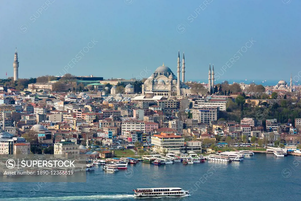 Skyline cityscape and the Blue Mosque and passenger ferry on Bosphorus in Istanbul, Turkey, Europe, Durasia