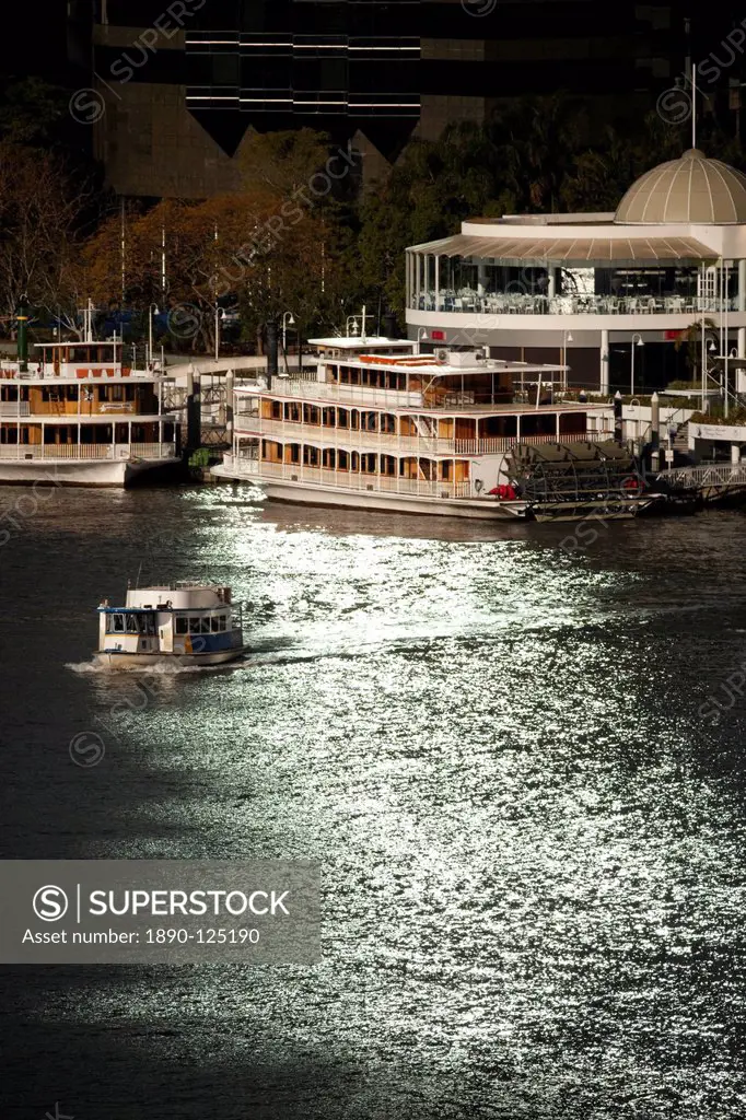 Paddle steamers at Eagle Street Pier and ferry boat on Brisbane River in city centre, Brisbane, Queensland, Australia, Pacific