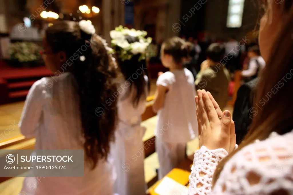 First Communion celebration in a Catholic church, Paris, France, Europe