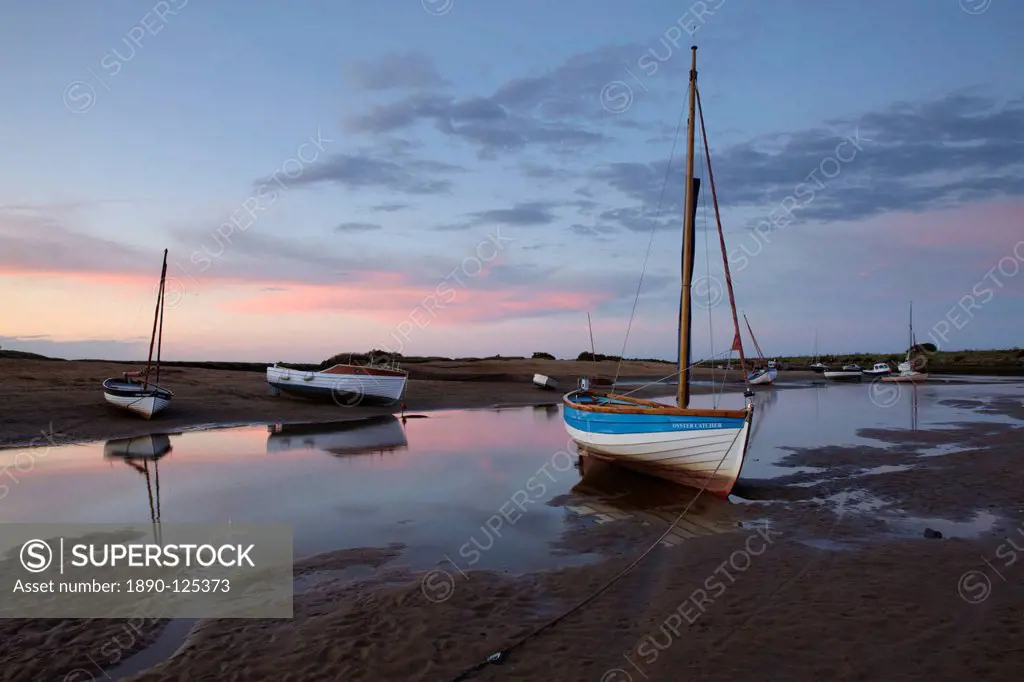 Sunset at low tide at Burnham Overy Staithe, Norfolk, England, United Kingdom, Europe
