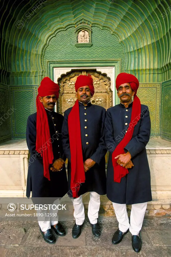Palace guards in turbans at the ornate Peacock Gateway, City Palace, Jaipur, Rajasthan state, India, Asia