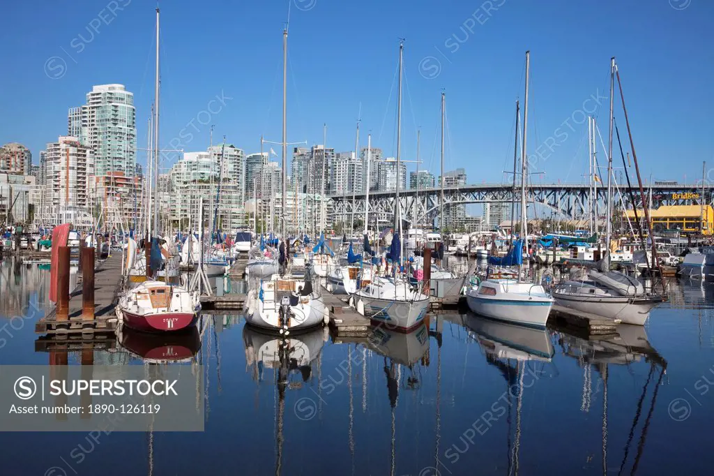 Yachts moored in False Creek at Granville Island with Granville Bridge, Vancouver, British Columbia, Canada, North America