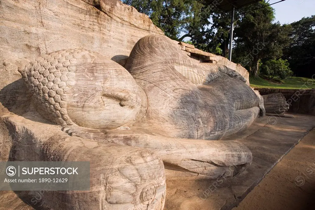 Giant reclining image of the Buddha entering Nirvana, one of a group of Buddha images cut from one slab of granite, at the Gal Vihara, Polonnaruwa, UN...