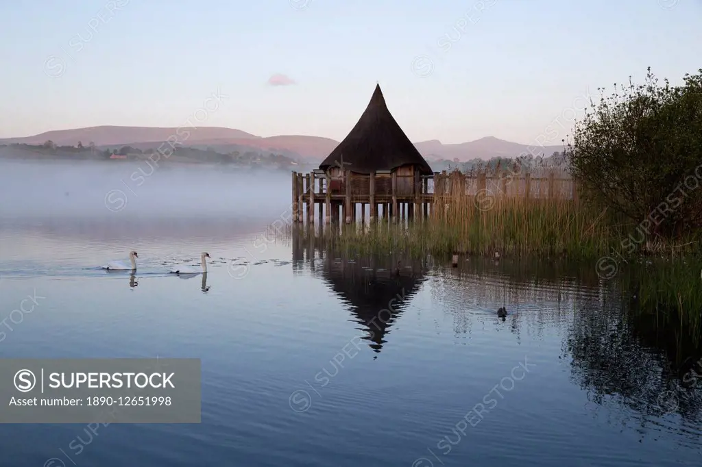 Llangorse Lake and Crannog Island in morning mist, Llangorse, Brecon Beacons National Park, Powys, Wales, United Kingdom, Europe