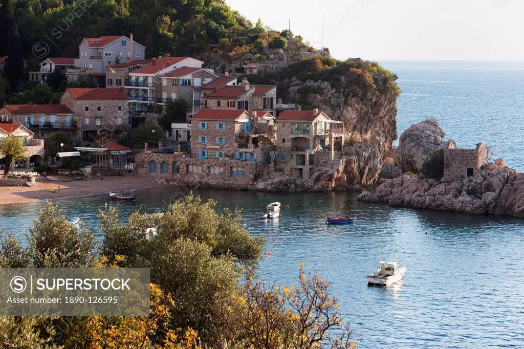 Houses, harbour and beach at Przno on the Adriatic coast, Montenegro, Europe