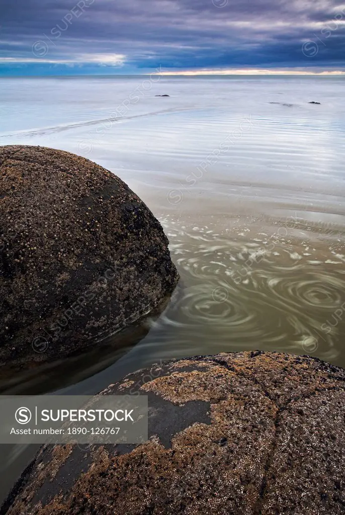 The unusual circular Moeraki boulders along the Otago Coast, Otago, South Island, New Zealand, Pacific