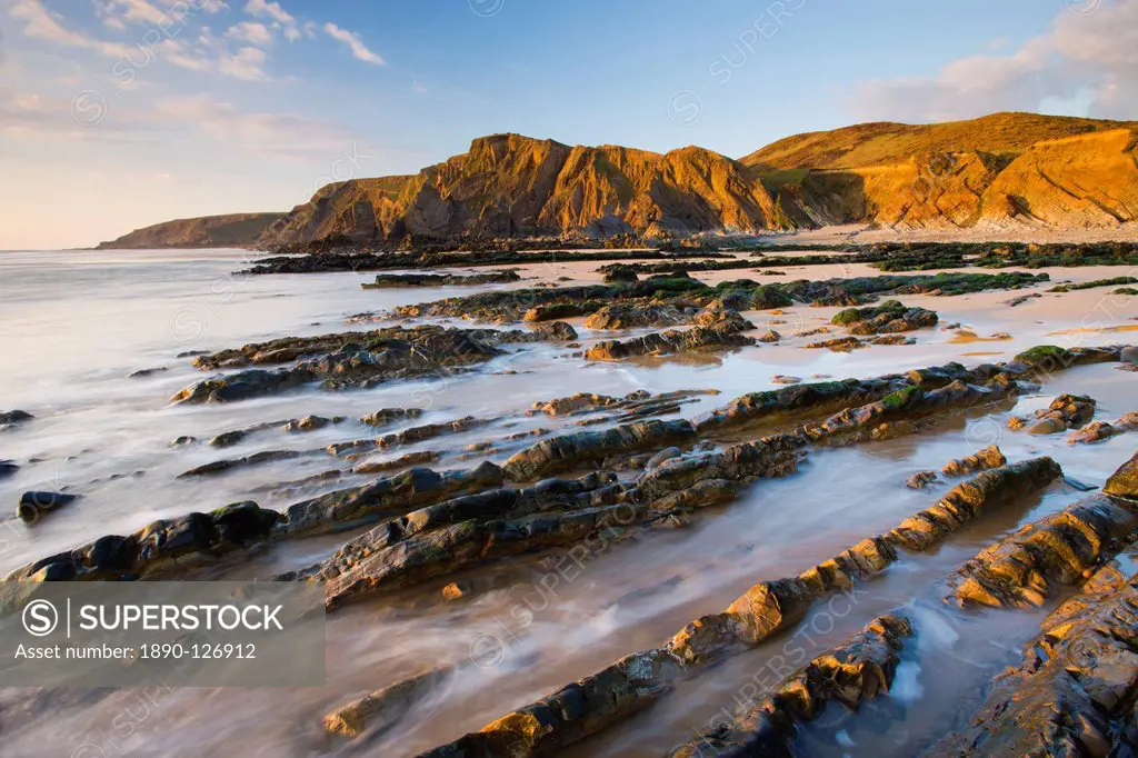 Eroded ledges exposed at low tide, Sandymouth, North Cornwall, England, United Kingdom, Europe