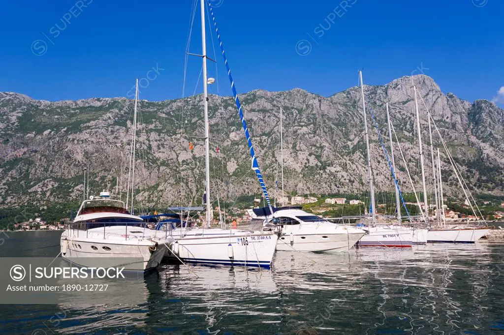 View of the Fjord, moored sailing boats and mountains, Kotor, Bay of Kotorska, Adriatic Coast, Montenegro, Europe