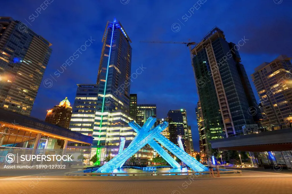 Olympic Flame burner at night near the Convention Centre, Waterfront downtown, Vancouver, British Columbia, Canada, North America