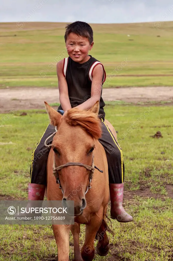Horse and boy riding bareback at summer nomad camp, Khujirt, Uvurkhangai (Ovorkhangai), Central Mongolia, Central Asia, Asia