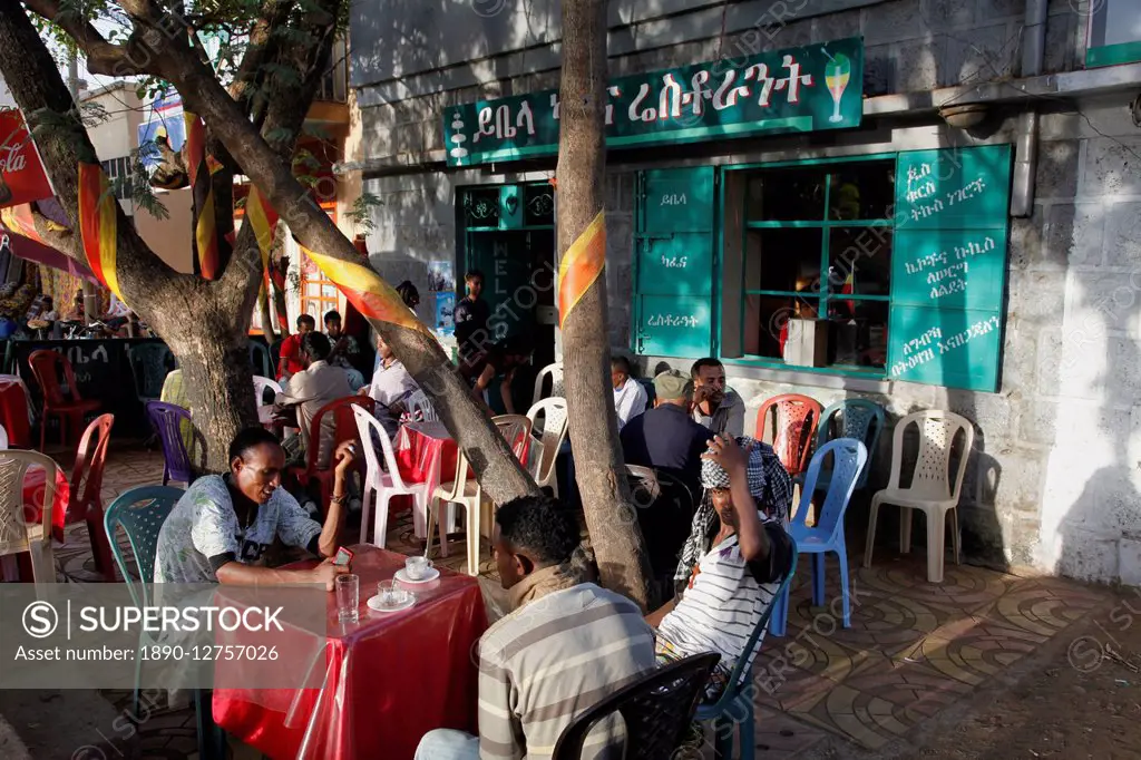 People talking and sitting in cafes in Bahir Dar, Ethiopia, Africa