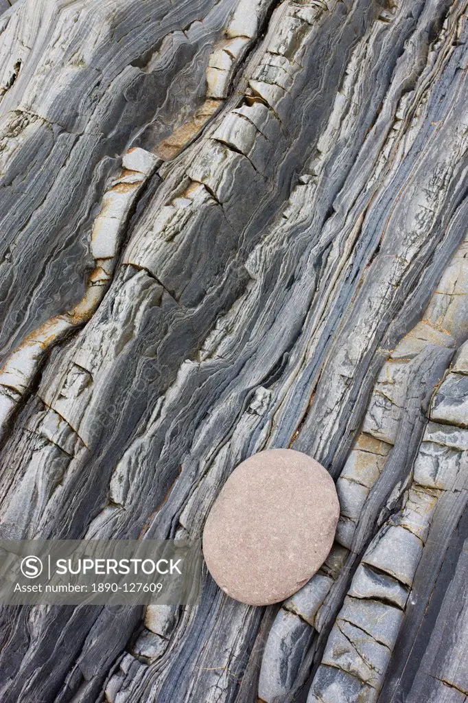 Rock strata and pebble in the cliffs at Bude, Cornwall, England, United Kingdom, Europe