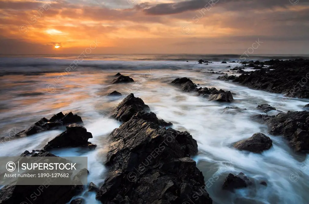 The rugged Gower coast greets a rapidly rising tide, South Wales, Wales, United Kingdom, Europe