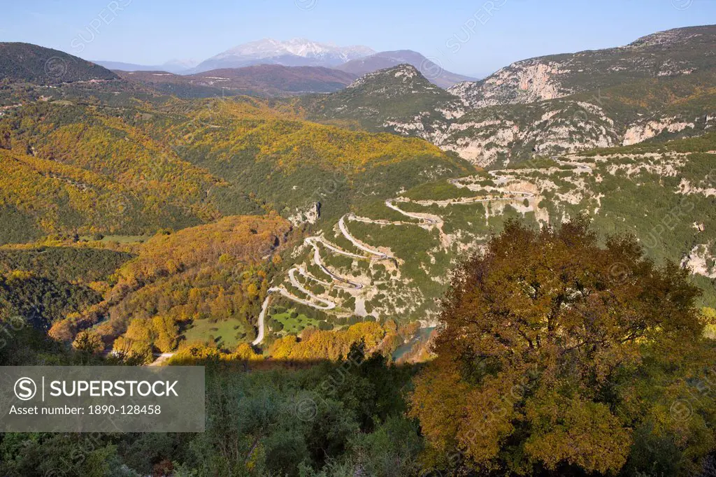 Looking down onto the hairpin bends as the road winds up the hill towards the Papingo Papigo villages in Zagoria, Epirus, Greece, Europe